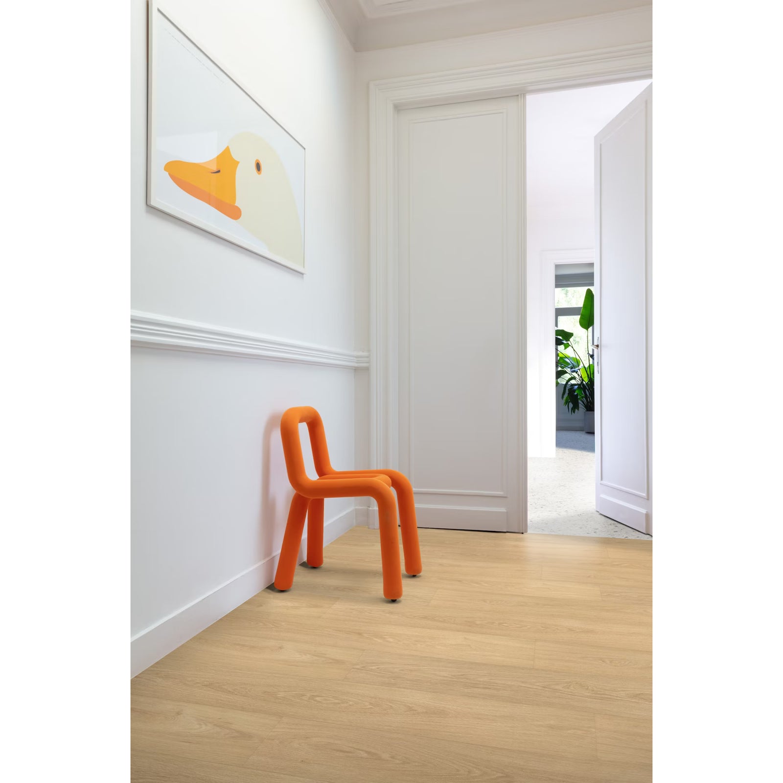 Vibrant orange plastic chair with sleek minimalist design paired with paris tan f001 long vinyl planks flooring