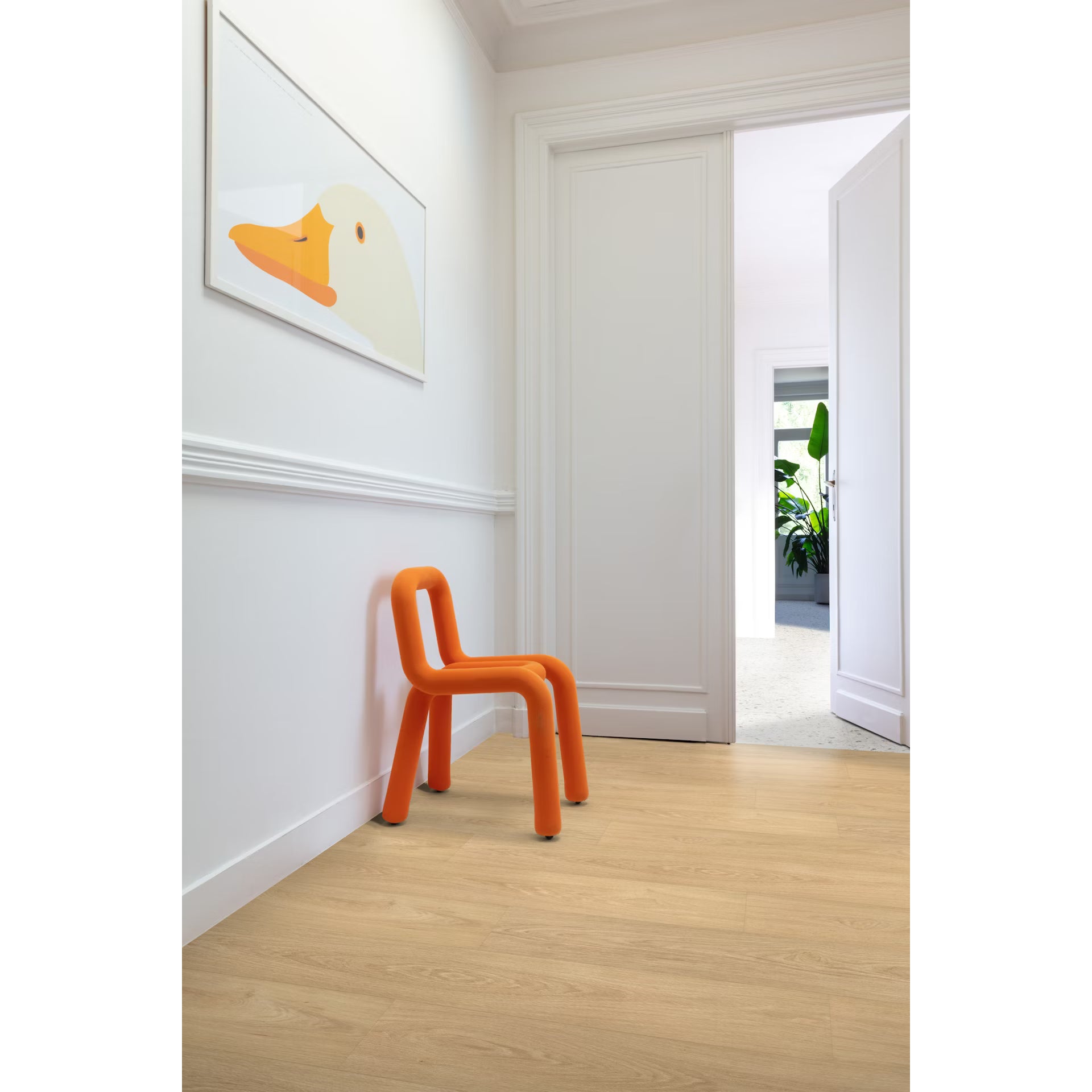 Vibrant orange plastic chair with sleek minimalist design paired with paris tan f001 long vinyl planks flooring
