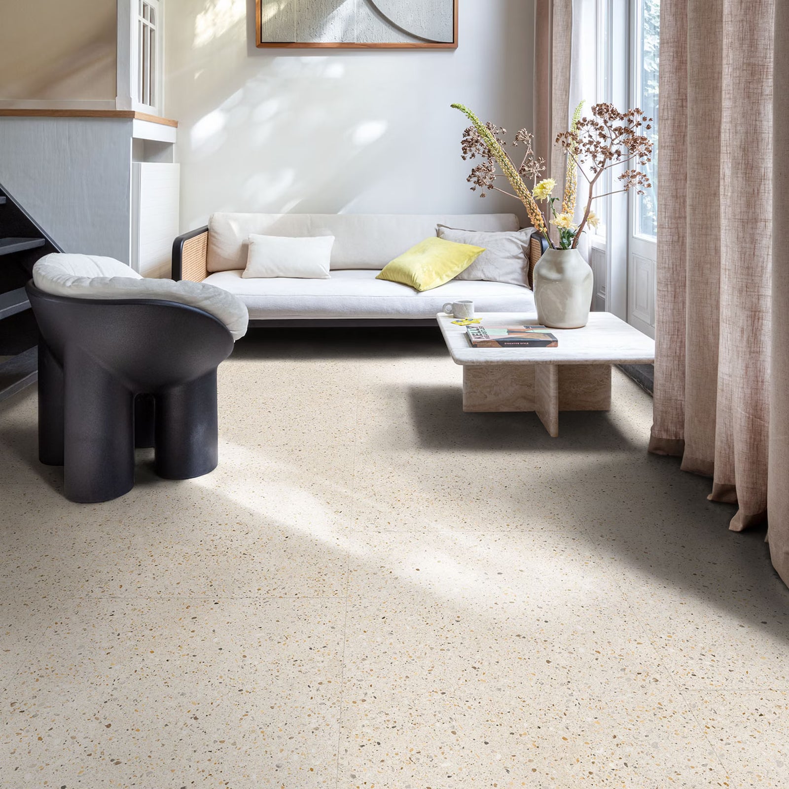 Beige piccolo f032 terrazzo vinyl tile with speckled texture and subtle natural light reflections on the surface