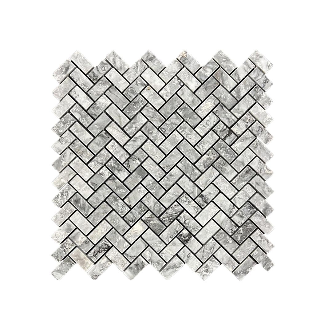 Full mesh-backed sheet of Platinum Grey honed marble herringbone mosaic showing the interlocking grey batons