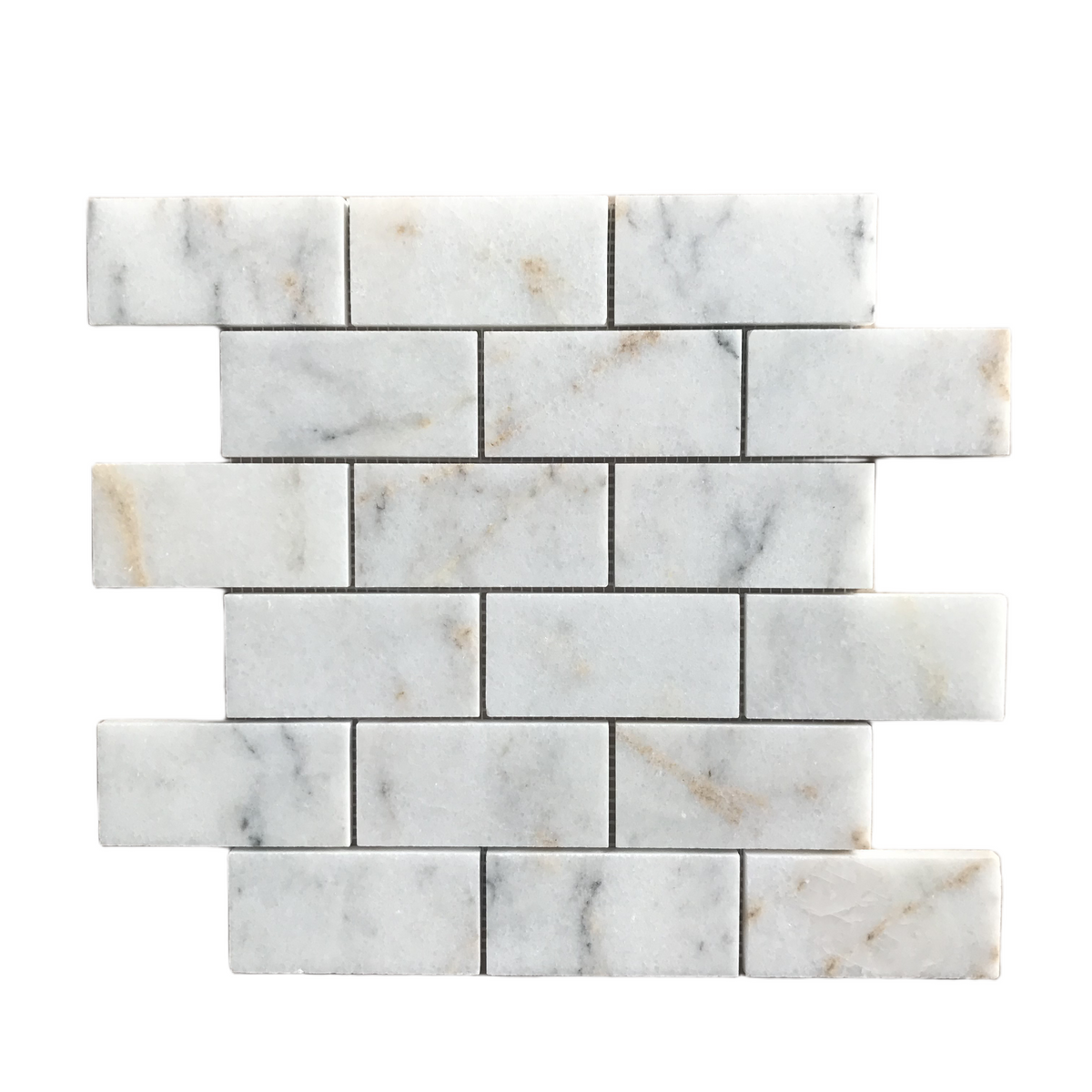 Full sheet of Calacatta Sugar honed marble brick mosaic showing grey veining across staggered white bricks