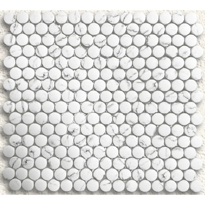 White marble mosaic tile with round glossy pieces in a grid pattern from Ritz Statuario round mosaic collection