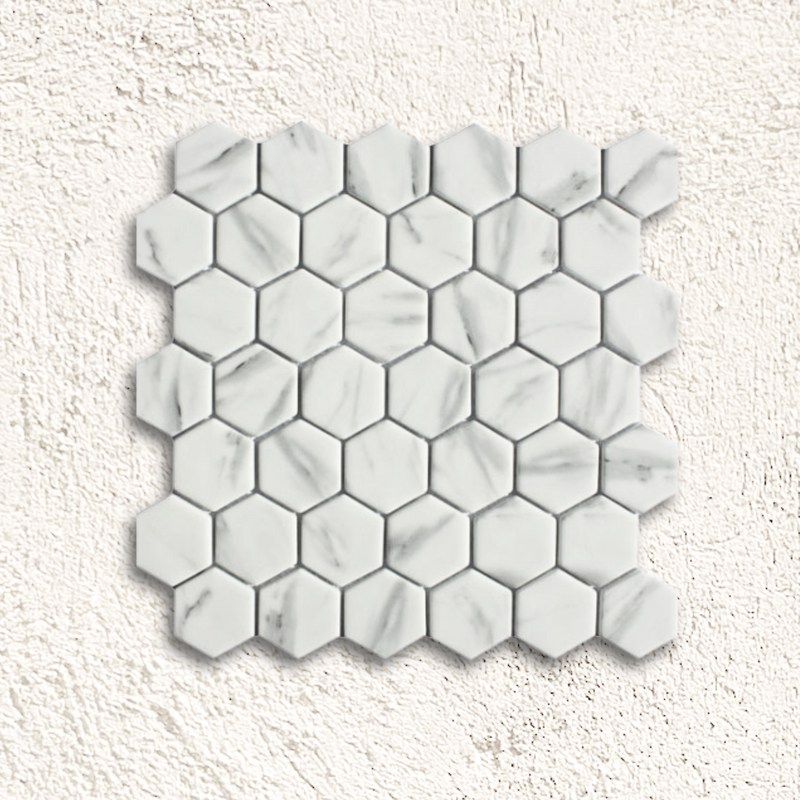 Ritz carrara hexagon mosaic white marble tile with subtle gray veining in a hexagonal pattern