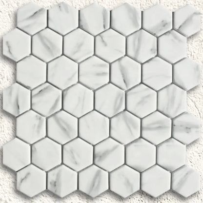 Ritz carrara hexagon mosaic white marble tile with subtle gray veining in a hexagonal pattern