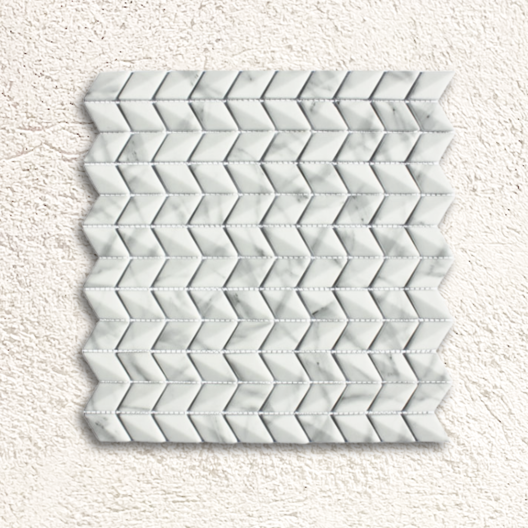 White marble mosaic tile featuring a diamond chevron pattern in ritz carrara for stylish wall or floor decor