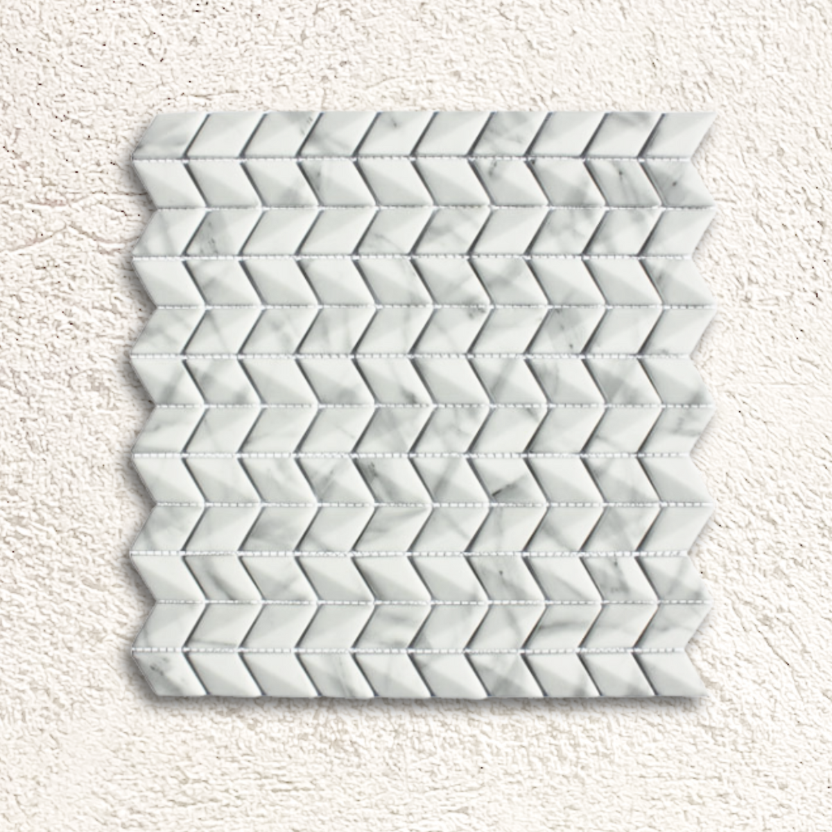 White marble mosaic tile featuring a diamond chevron pattern in ritz carrara for stylish wall or floor decor