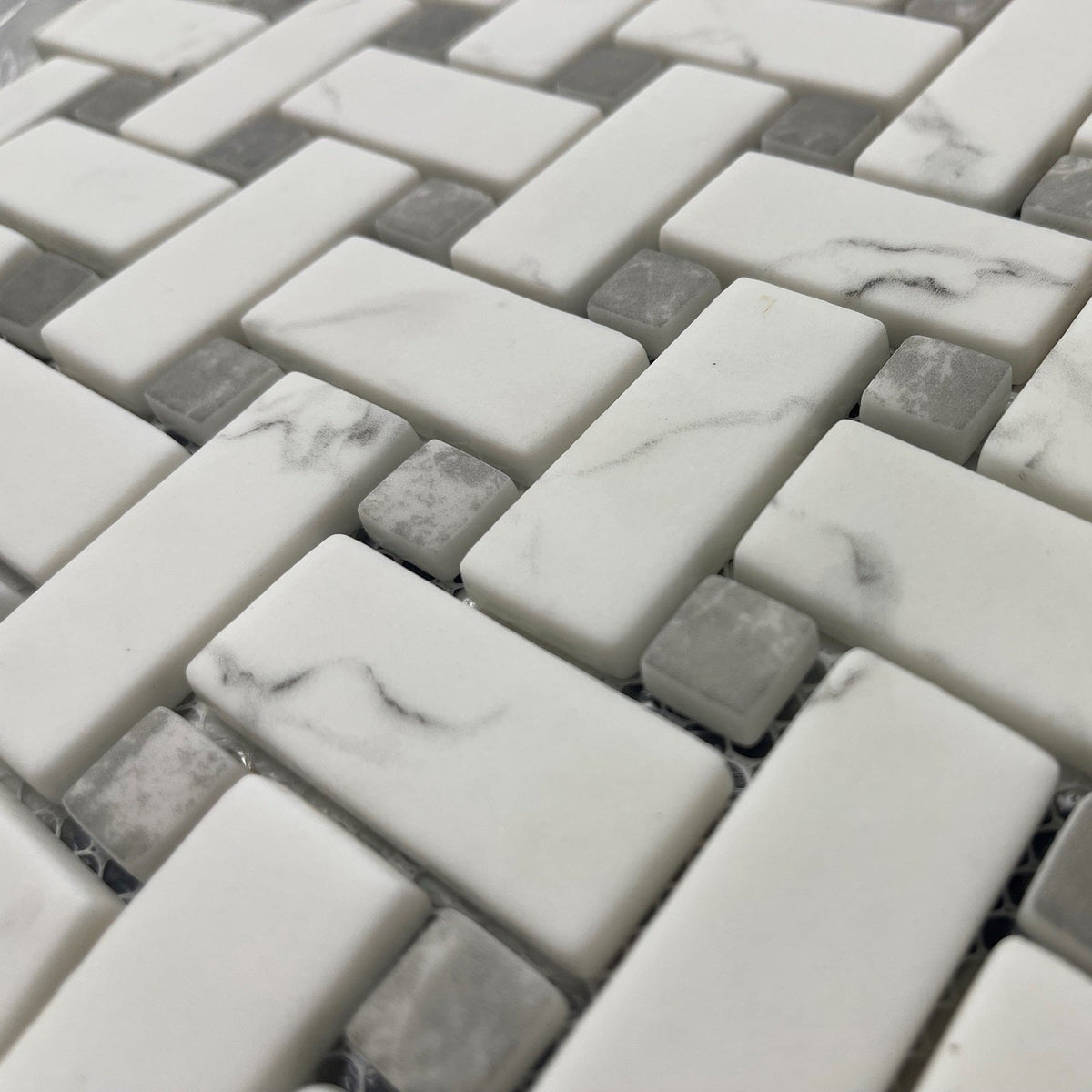 Ritz Carrara Grey Marble Basketweave mosaic in white and grey marble with a woven basketweave pattern