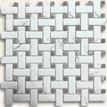 White marble basketweave mosaic tile with woven pattern featuring rectangular pieces and grey marble accents