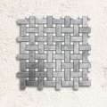 Ritz Grey Marble Carrara basketweave mosaic tile featuring gray marble with small white square accents