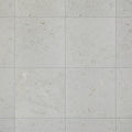 Brushed Shellstone limestone used on a bathroom wall beside pale joinery