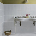 Belgravia Mist Gloss 7.5 x 30cm grey ceramic metro tiles in a room setting