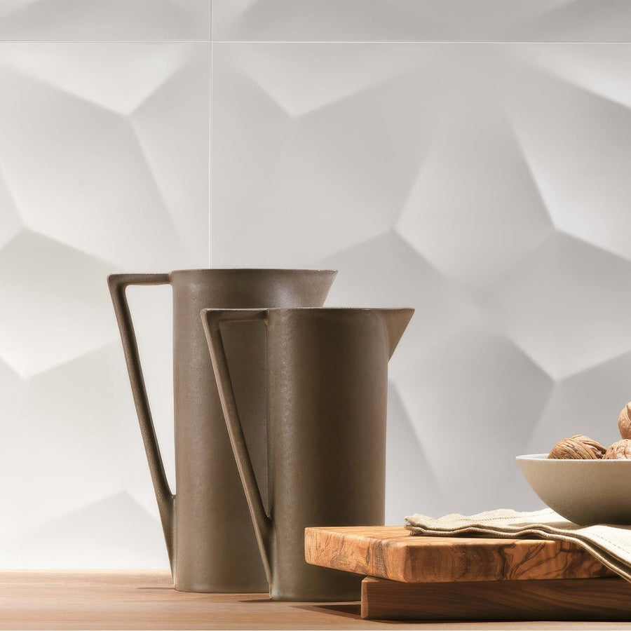 Two taupe matte ceramic pitchers with minimalist geometric handles on wood surface in 3d diamond white matt collection