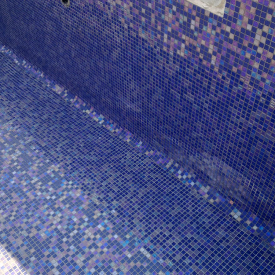 Abalon Azure blue glass mosaic tiles in a bathroom setting
