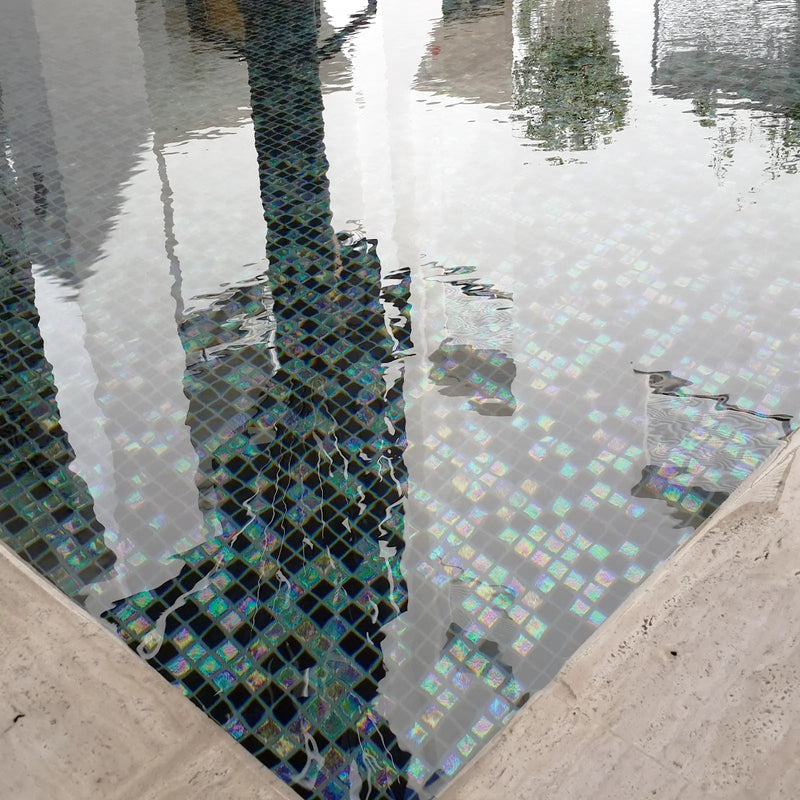 Abalon Abyss deep blue glass mosaic tiles shown as a feature wall