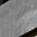 Abalon Pewter warm grey glass mosaic tiles in a bathroom setting