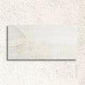 Dubai Pearl 32 x 62.5cm porcelain marble effect tile face