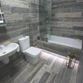 Origen Dark 15 x 90cm porcelain wood effect tile room setting
