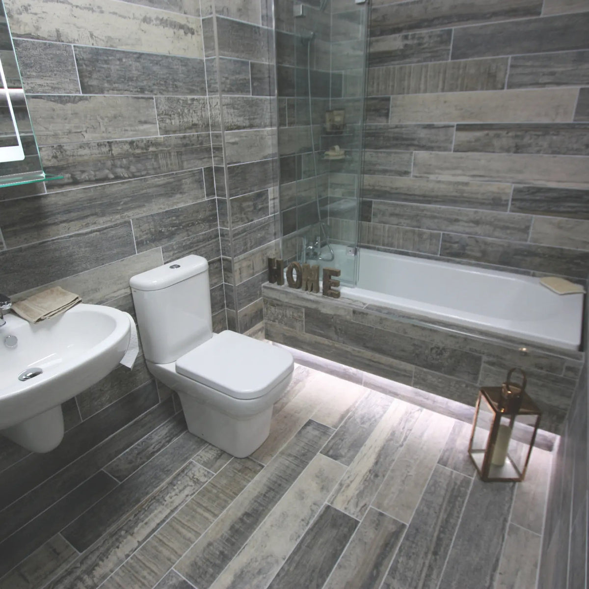 Origen Dark 15 x 90cm porcelain wood effect tile room setting