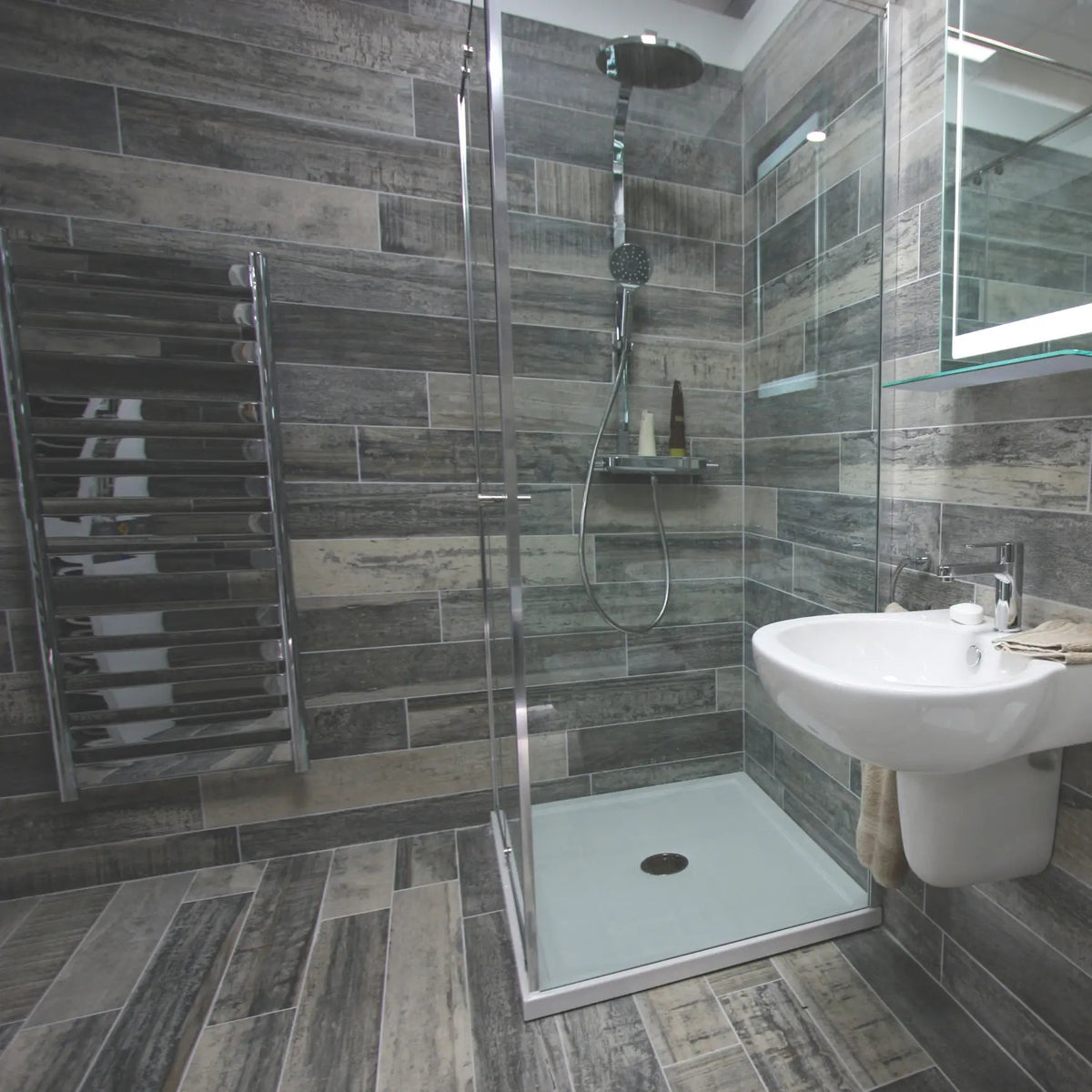 Origen Dark 15 x 90cm porcelain wood effect tile room setting