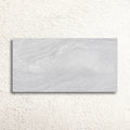 Varana Gris 32 x 62.5cm grey porcelain stone effect tile face