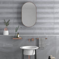 Austral Gris 32 x 62.5cm stone effect porcelain tile room setting