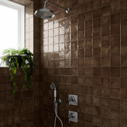 Dakota Chocolate zellige-style gloss tiles styled with warm interior decor