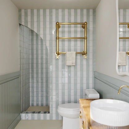 Remy Sage green gloss brick wall tile 6.5 x 13cm shown in a room setting