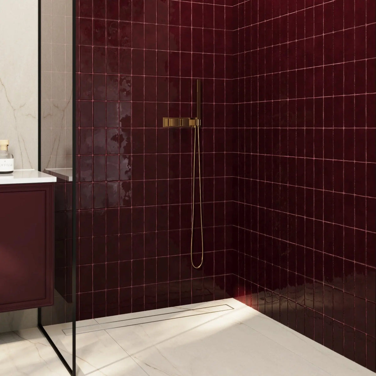 Remy Wine red gloss brick wall tile 6.5 x 13cm shown in a room setting