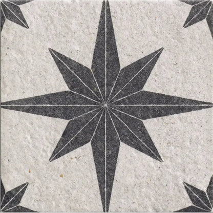 Tile with a star pattern on a textured surface