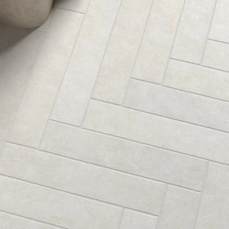 Sutton Snow stone-effect porcelain tiles in a bathroom setting
