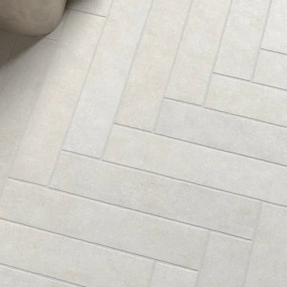 Sutton Snow stone-effect porcelain tiles in a bathroom setting