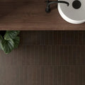 Sutton Cocoa stone-effect porcelain tiles in a bathroom setting
