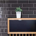 Aria Black Gloss 10 x 30cm glazed ceramic metro tile room setting