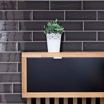 Aria Black Gloss 10 x 30cm glazed ceramic metro tile room setting