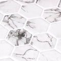 White hexagonal mosaic tiles with gray marble veining in hex xl fosco matte mosaic for wall and floor use