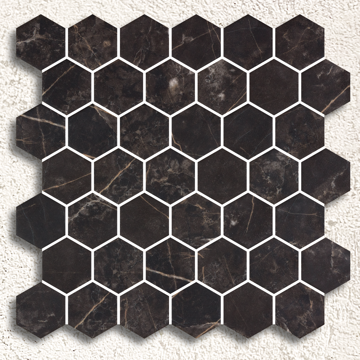 
Dark brown hexagonal marble mosaic tiles with subtle veining in crisp white grout from hex xl coimbra matte mosaic