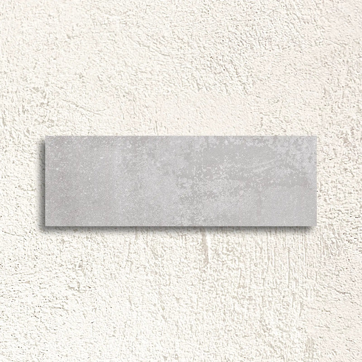 Neutra Pearl 30 x 90cm glazed ceramic concrete-effect wall tile face