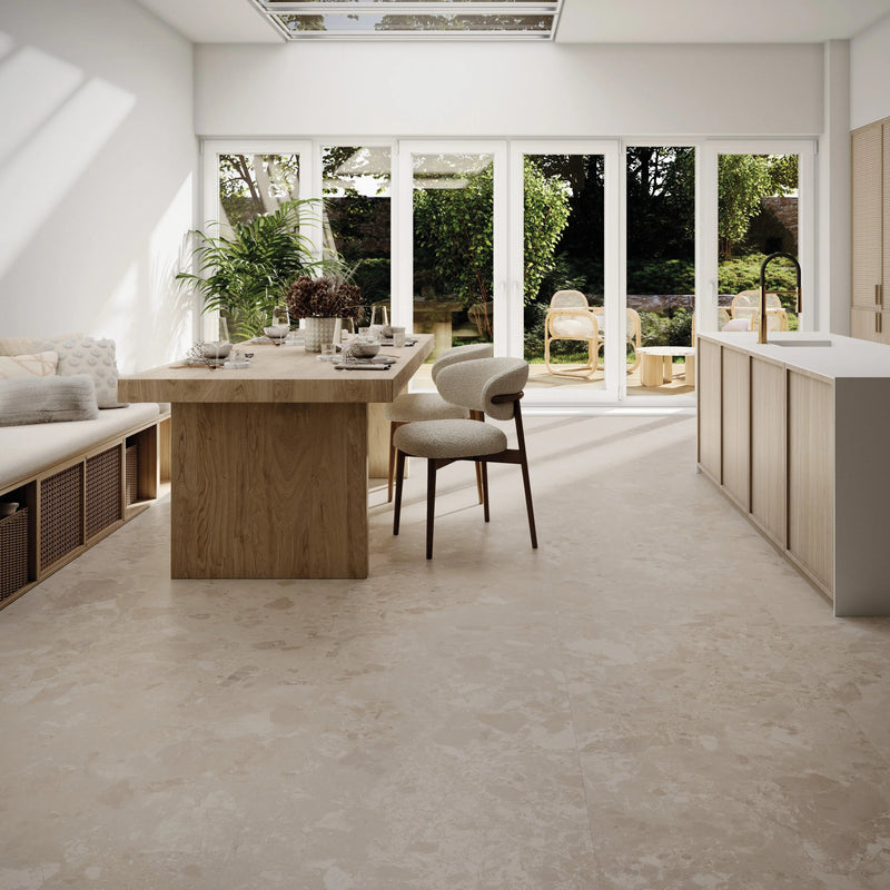 Bord Sand warm beige large-format porcelain tiles in a room setting