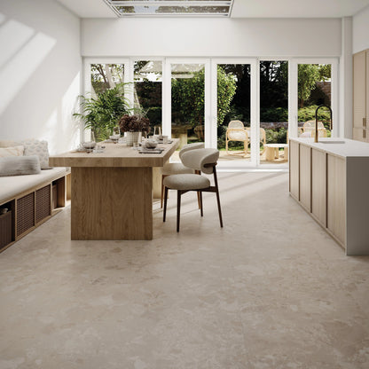 Bord Sand warm beige large-format porcelain tiles in a room setting