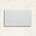 Blaze Ondas Perla 33.5 x 55cm pearl grey wave relief matt ceramic tile face