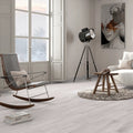 Aire Blanco 20x120cm pale grey wood effect porcelain plank flooring shown in an interior