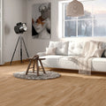 Aire Roble 20x120cm warm oak wood effect porcelain plank flooring in a room setting