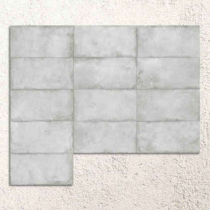 Alloy Pearl Semi Polished 60x120cm pale metal effect porcelain tiles shown as a large surface