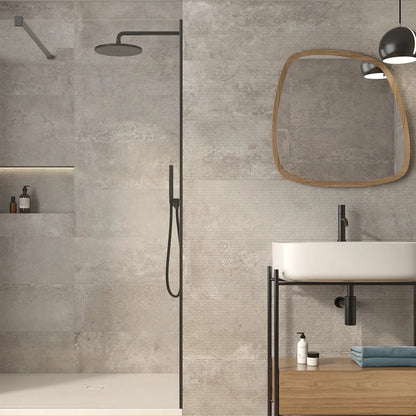 Modern bathroom with concrete walls, a sink, and a mirror.