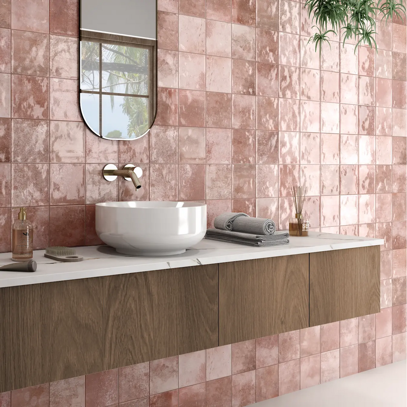 Adonara Sienna terracotta gloss ceramic wall tiles styled in a room setting