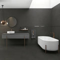 Wave Plumb 30 x 60cm glazed ceramic concrete effect tile room setting