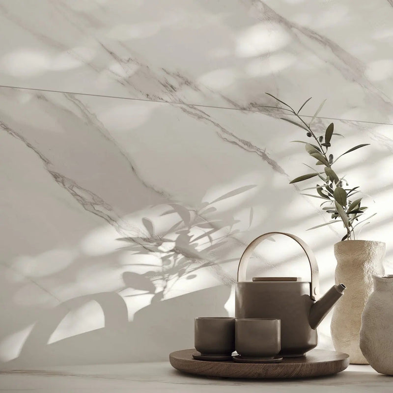 Apollo Cloud airy marble effect porcelain tiles in an open-plan living space