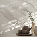 Apollo Cloud airy marble effect porcelain tiles in an open-plan living space