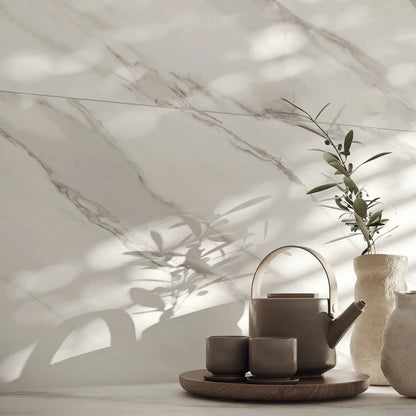 Apollo Cloud airy marble effect porcelain tiles in an open-plan living space