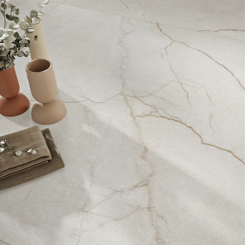 Alba Ecru marble effect porcelain wall and floor tiles in an elegant room setting